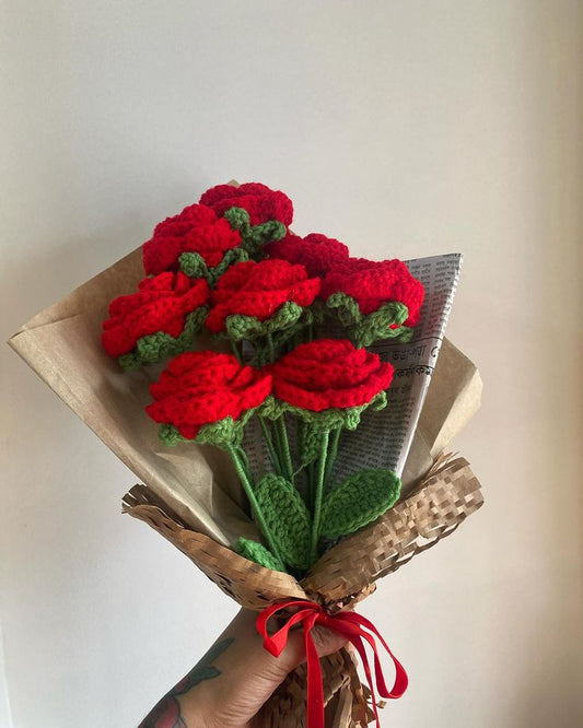 Handmade red crochet rose bouquet with green leaves and ribbon by Verity
