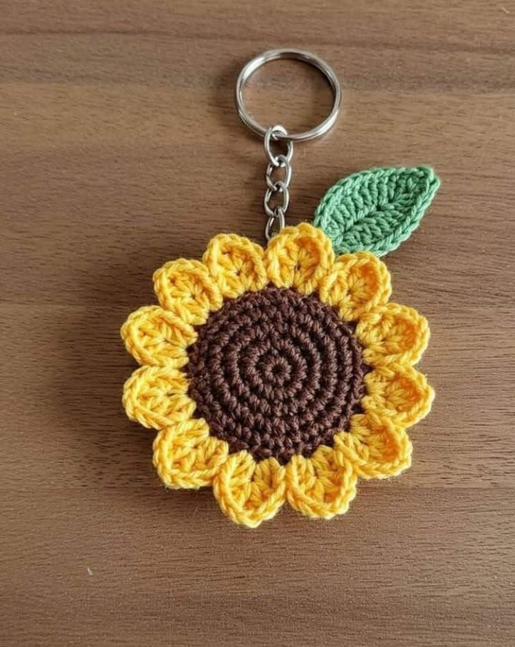 Handmade crochet sunflower keychain with leaf by Verity